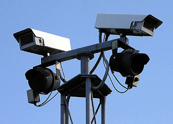 English: Two fixed-view security cameras, and ... English: Two fixed-view security cameras, and ...