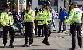 Greater Manchester Police officers in Piccadil... Greater Manchester Police officers in Piccadil...