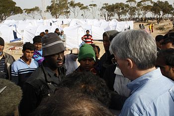 UK International Development Secretary, Andrew... global refugee crisis, UK MInister talks to refugees in Tunisia