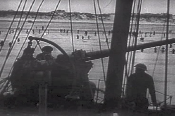 English: Royal Navy gunner covering the troops... English: Royal Navy gunner covering the troops...