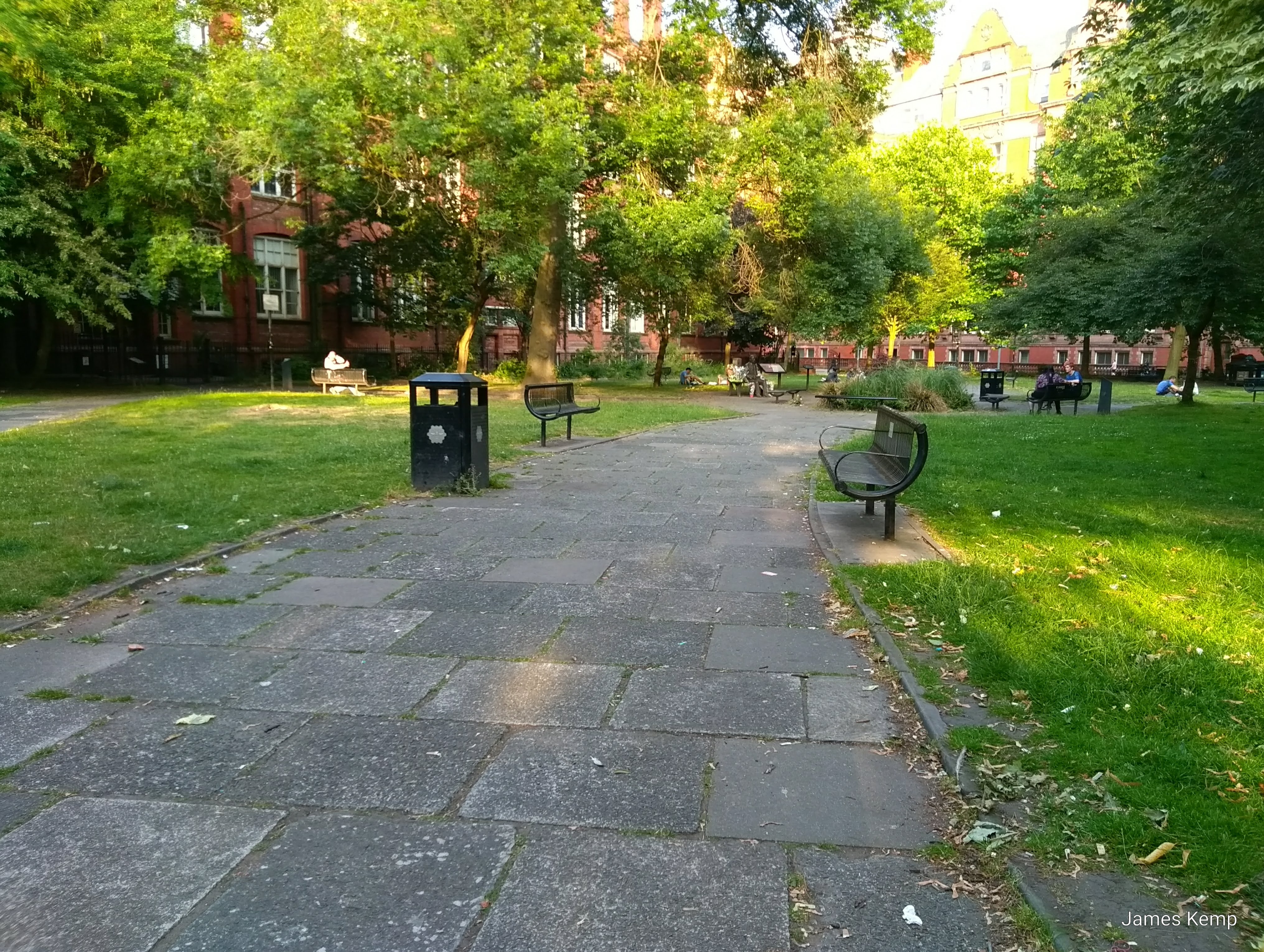 View of Sackville Park, Alan Turing memorial in the middle and the University of Manchester in the background. (Photo: James Kemp)